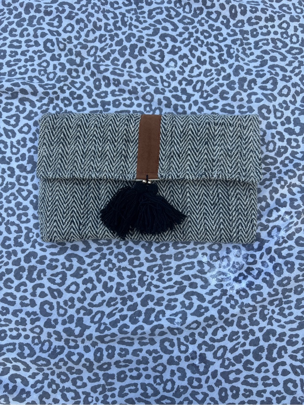 The Royal Standard Herringbone Foldover Clutch with Tassel - Black & Cream
